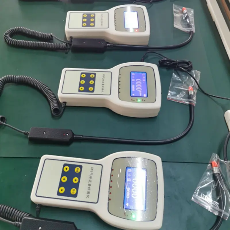 Multiple units of ZWLDS Portable SF6 Gas Leakage Detectors on an assembly and testing bench