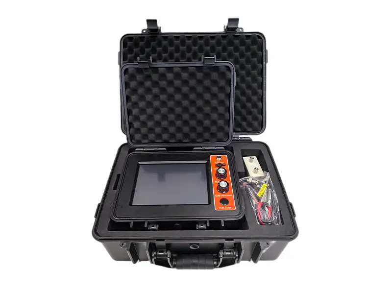 Field engineer using a portable cable fault locator.
