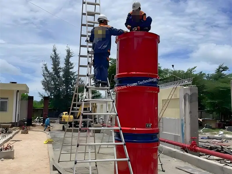 Engineers setting up the Variable Frequency Series Resonance tester for outdoor equipment testing.