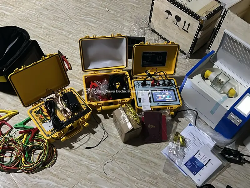 Unboxing of ZHIWEI transformer testing equipment including DC winding resistance tester, hipot tester, and turns ratio tester at customer site.